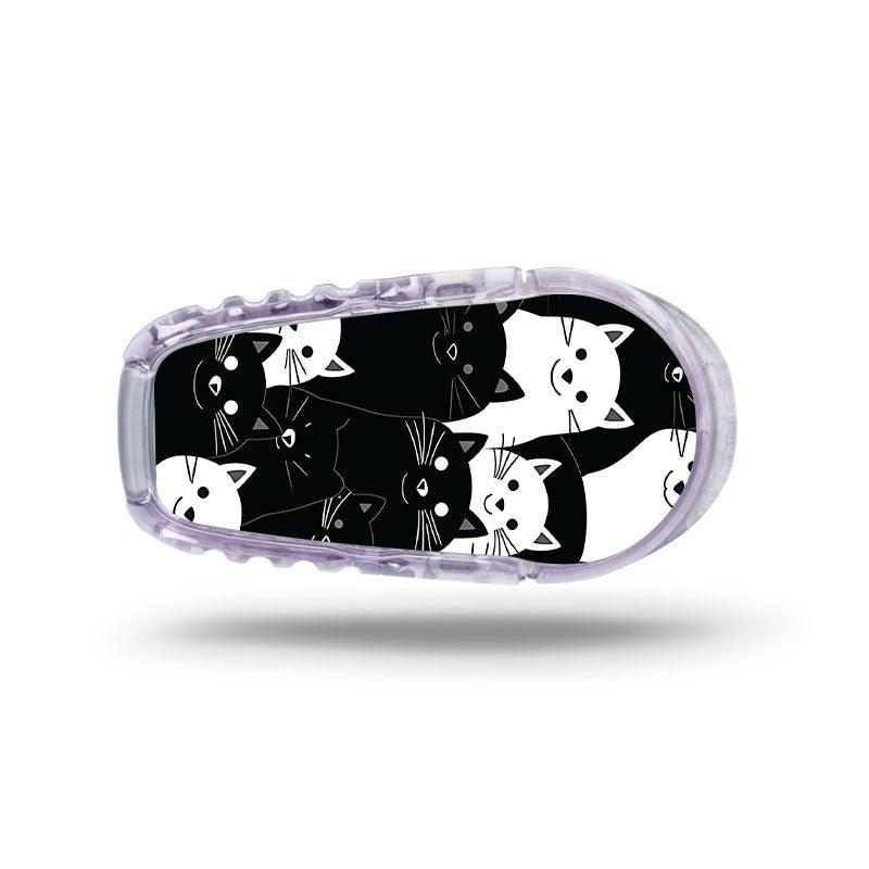 Dexcom G6 transmitter sticker: Black and white cats - The Useless Pancreas